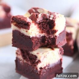 two red velvet brownies stacked on each other
