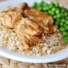 San Francisco Slow Cooker Pork Chops with rice and green peas.