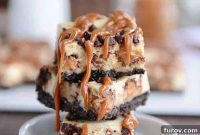 Loaded Snickers Cheesecake Bars