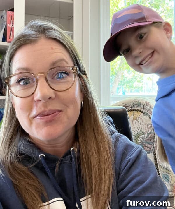 A warm and loving selfie of a mother and daughter, capturing a tender moment of connection.