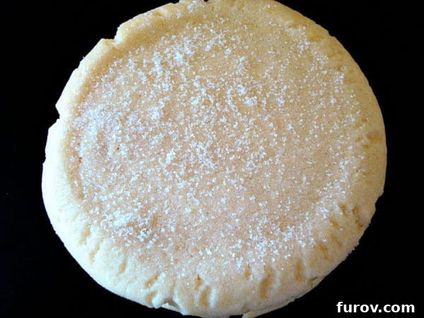 Crystal Confections 3 Close-up top view of a single frosted Sugar Gem cookie, showcasing its soft texture.