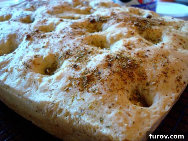 A beautifully baked loaf of Blitz Bread, showcasing its inviting golden crust and rustic texture, suggesting a perfect accompaniment to any meal.