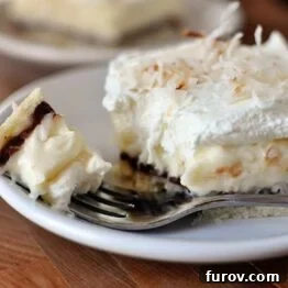 Dreamy Chocolate Coconut Cream Bars 4 A delicious slice of Chocolate and Coconut Cream Pie Bar.
