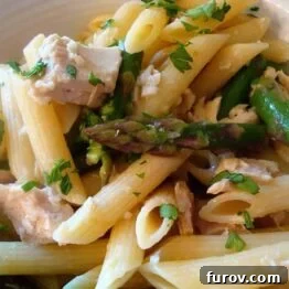 A small, cropped image of Garlic Tuna Pasta with Asparagus.