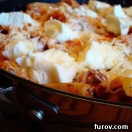 Close-up of the delicious Simple and Meaty Skillet Lasagna, showcasing its rich sauce, tender noodles, and creamy melted cheese.