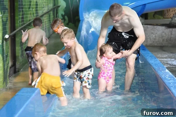 Saturday Shots 2 Family enjoying a hotel waterslide during a memorable birthday trip in Winnipeg