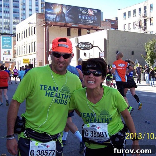 Mary Jo's Journey 5 Mary Jo and her husband smiling proudly after successfully completing a marathon together.