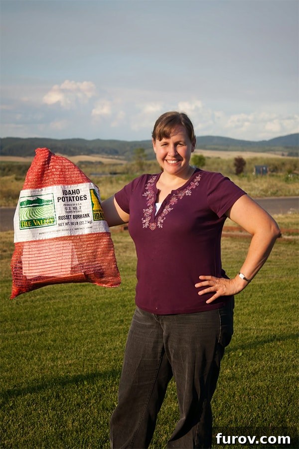 Christina the night before her marathon, holding a sack of potatoes, symbolizing the burdens she overcame and her immense strength and readiness.