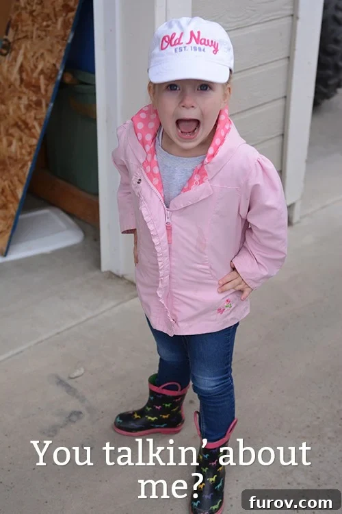 Dinner Done: When Youre Too Busy or Tired to Cook 3 A young girl in a pink jacket and white hat, looking thoughtful and sweet.