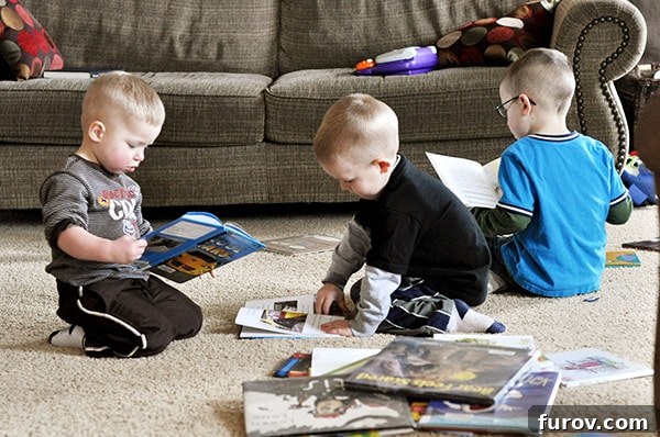 Unleash Imagination: Our Favorite Summer Reads for Kids 5 Three little boys enjoying books, reading together on the floor.