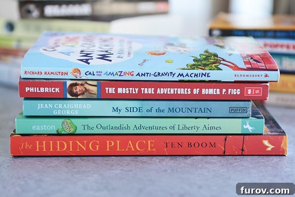 Unleash Imagination: Our Favorite Summer Reads for Kids 7 A stack of five engaging children's books arranged on a kitchen counter.