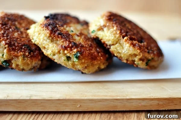 My Favorite Healthy Meals and Go-To Healthy Living Tips 3 Golden brown little quinoa patties served on a plate with fresh herbs