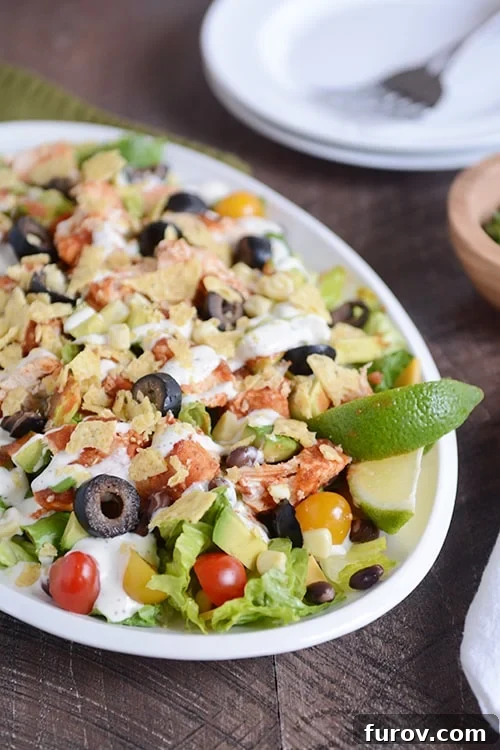 My Favorite Healthy Meals and Go-To Healthy Living Tips 5 A vibrant and fresh chicken taco salad served in a bowl