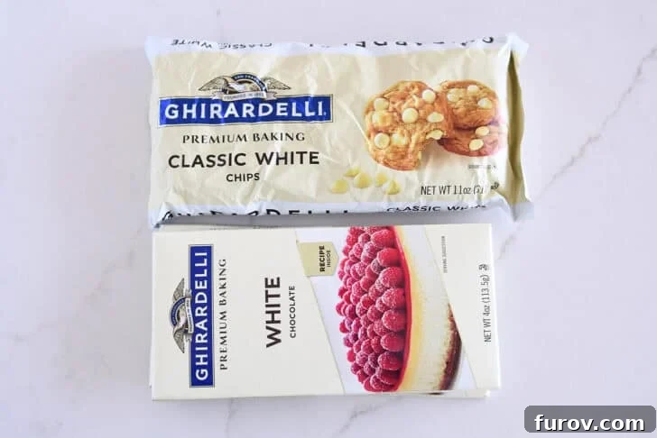 Ghirardelli white bar chocolate and bag of white chocolate chips.