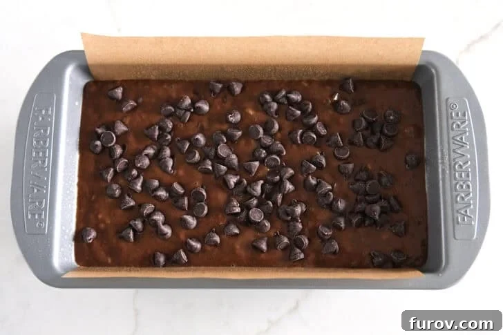 Chocolate Banana Bread with Sour Cream for Moist Loaves 6 Top down view of unbaked loaf of chocolate banana bread.