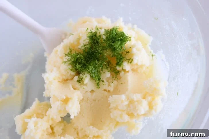 Copycat Swig Coconut Lime Sugar Cookies 4 Glass bowl with creamed sugar, butter, and fresh lime zest.