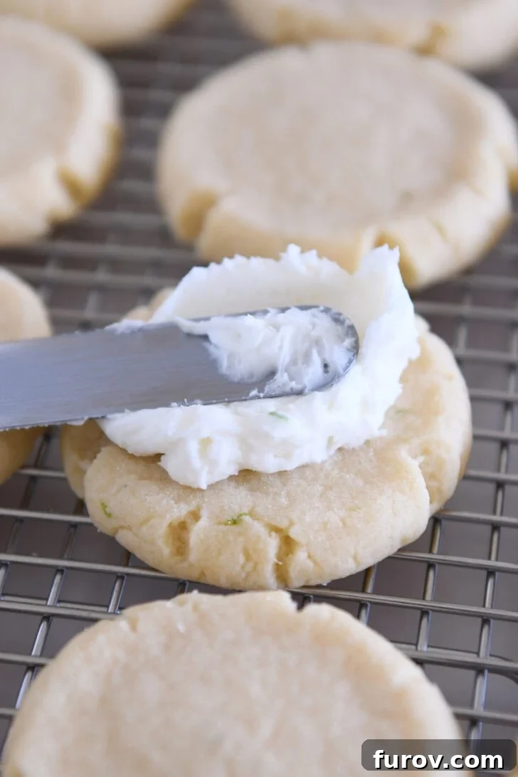 Copycat Swig Coconut Lime Sugar Cookies 8 Frosting round sugar cookie with coconut lime frosting.