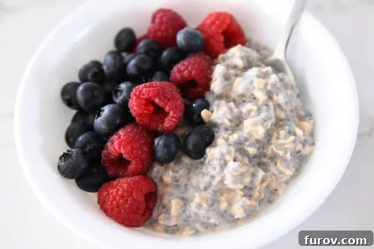 Surviving Midsummer: Friday Reflections and Tips 11 White bowl with chia oats, blueberries, and raspberries.